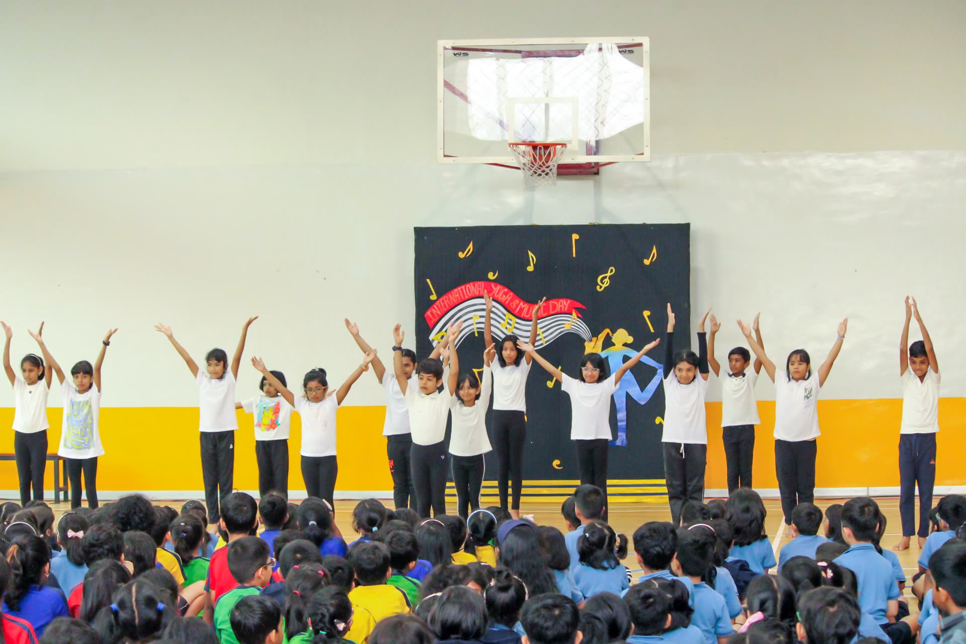 GEMS children performing together on stage